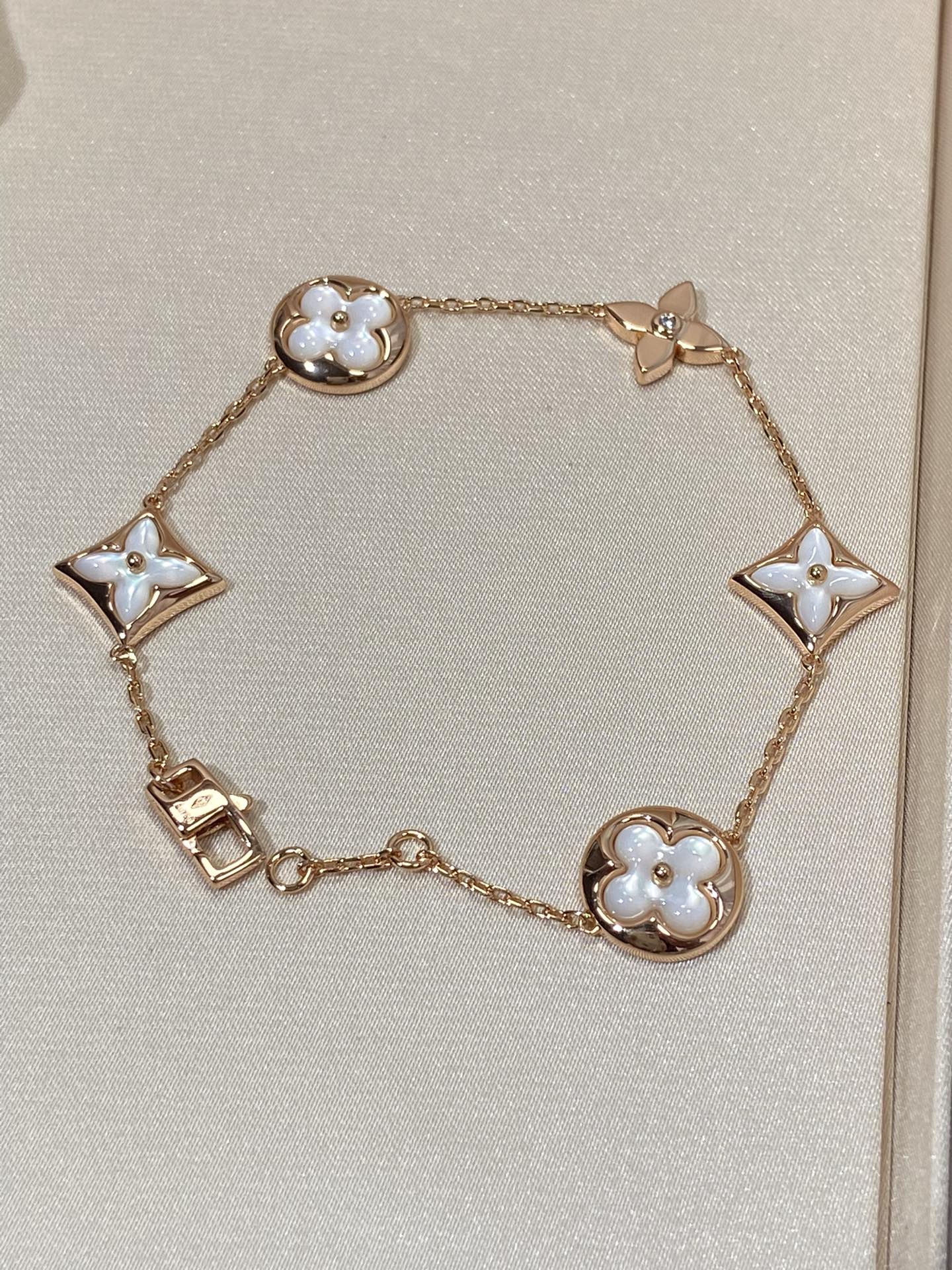 [Opulent Aurora]STAR AND SUN 5 MOTIF MOP PINK GOLD BRACELET